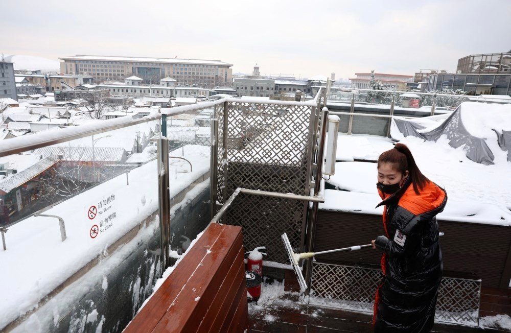 بكين تغلق مدارسها بسبب عواصف ثلجية